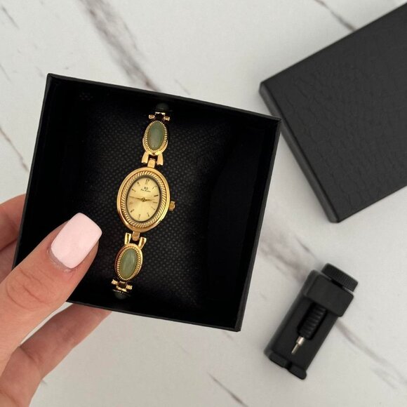 Sku:0357 cute gold watch bracelet with green natural stone inserts+in a gift bag